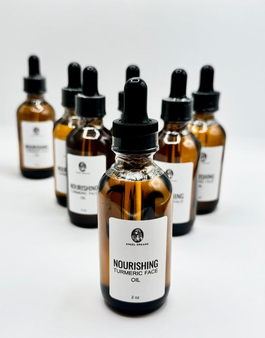 Bottles of Nourishing Turmeric Face Oil on a white background